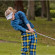 Female golfer in My Name'5 Doddie tartan